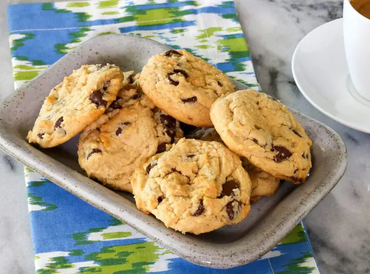 A small tray with baked peanut butter chocolate chip cookies.