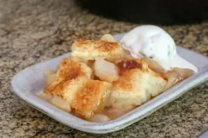 pear pandowdy serving with ice cream on the side