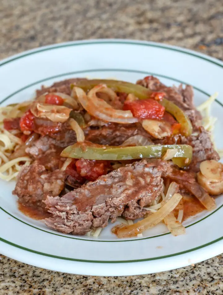 pepper steak strips with tomatoes, onions, and bell peppers.