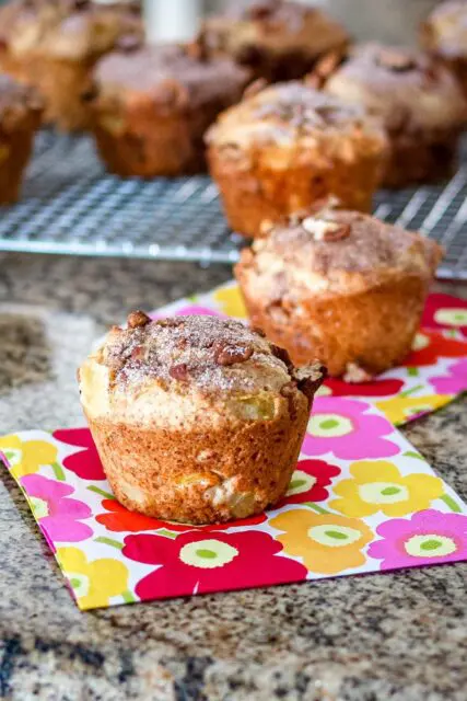 pineapple muffins on a cooling rack