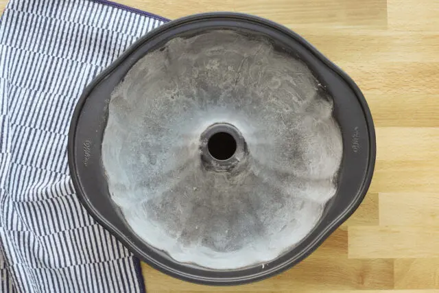 The Bundt cake pan is greased and generously floured.