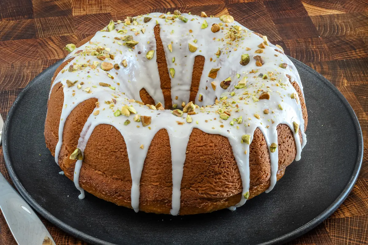 Moist pistachio cake made with a cake mix, pudding, and pistachios.