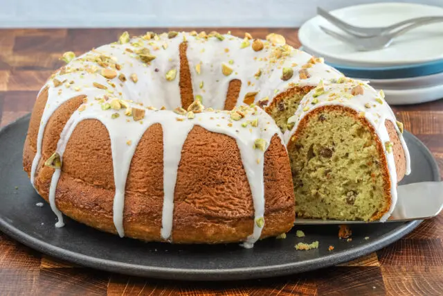 Moist pistachio cake made with a cake mix, pudding, and pistachios.