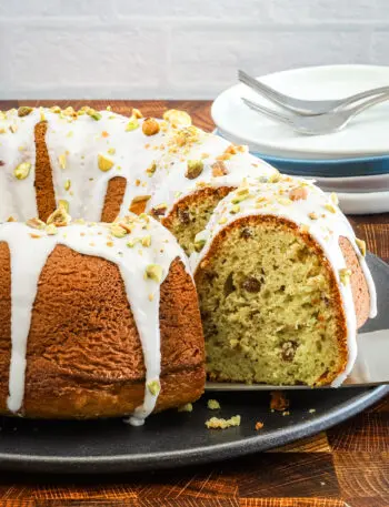 Moist pistachio cake made with a cake mix, pudding, and pistachios.