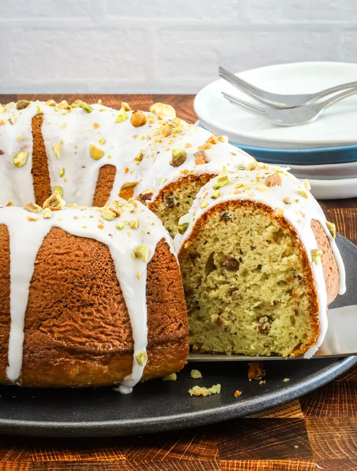 Moist pistachio cake made with a cake mix, pudding, and pistachios.