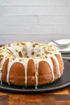 Moist pistachio cake made with a cake mix, pudding, and pistachios.