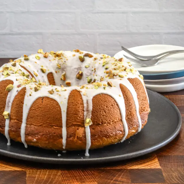 Moist pistachio cake made with a cake mix, pudding, and pistachios.