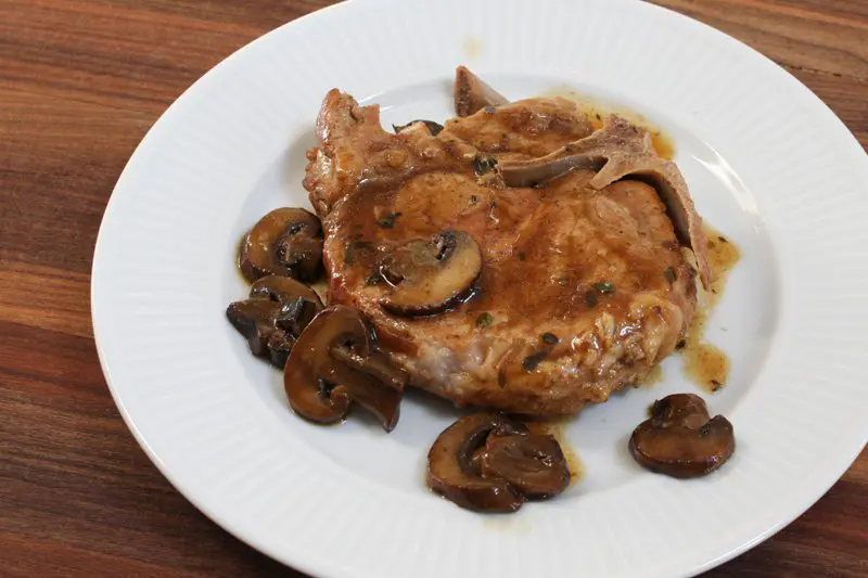 pork chops with mushrooms, plated
