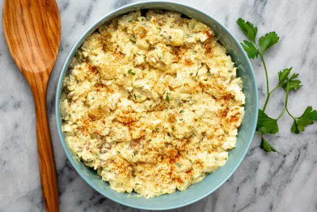 Bowl of potato and egg salad.