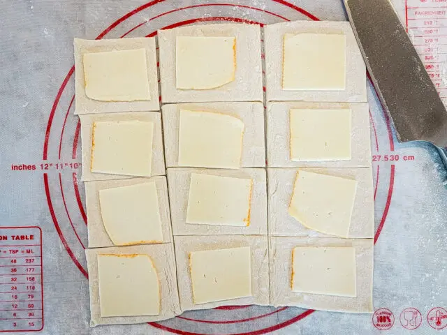 Optional step: add a slice of cheese to each square.