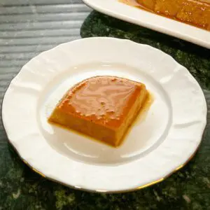 a slice of pumpkin flan on a plate