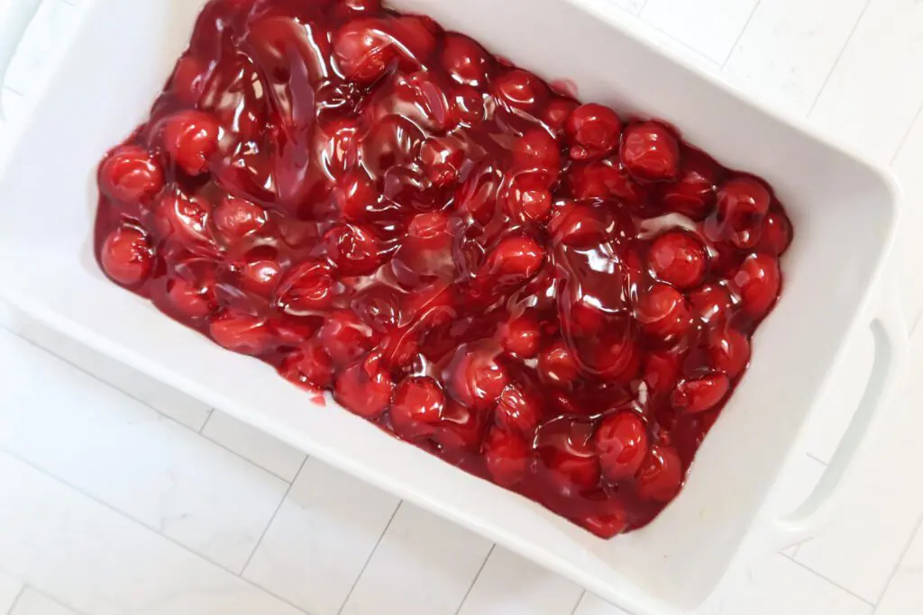 Cherry pie filling in the baking dish