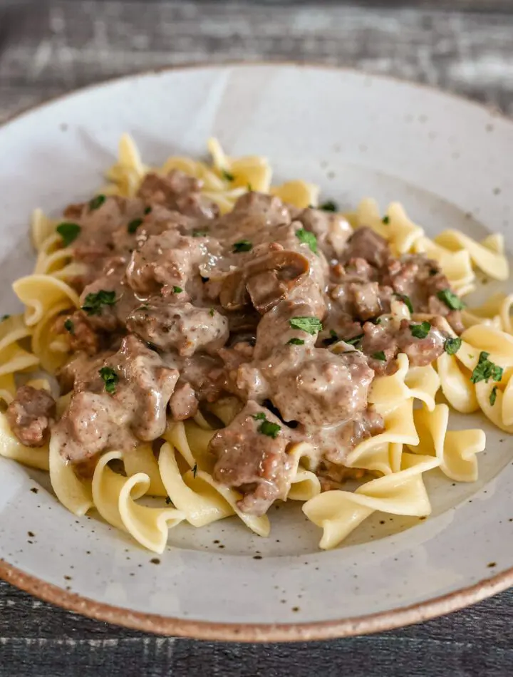 quick ground beef stroganoff over noodles