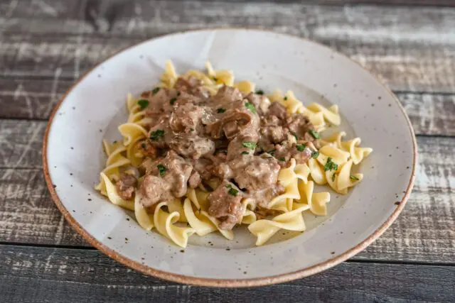 quick ground beef stroganoff over noodles