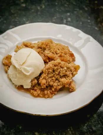 rhubarb crisp and ice cream on a plate