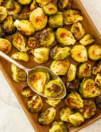 Roasted Brussels sprouts on a serving tray.