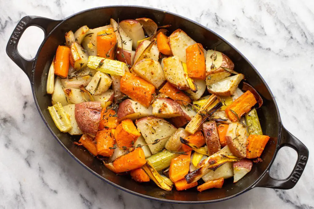 roasted root vegetables in a baking pan