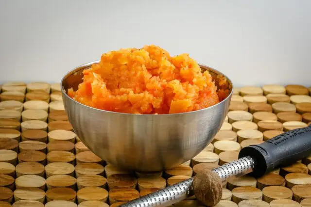 mashed rutabaga and carrots in a bowl