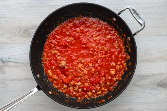 Simmering a pan of sausage ragu.