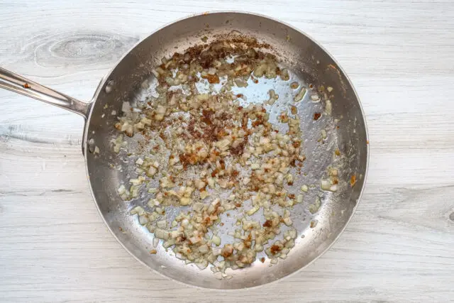 Browned onions in the skillet.