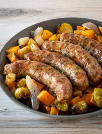 sheet pan sausages with autumn vegetables and pears