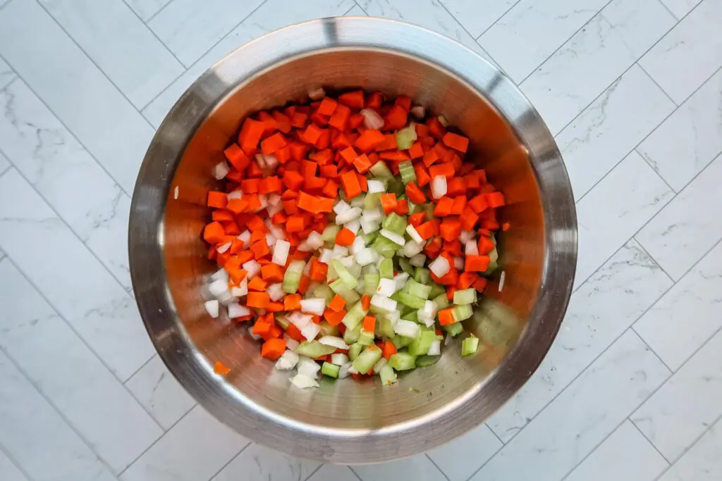 diced carrots, celery, and onions in a bowl