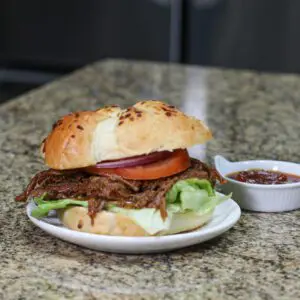 slow cooker shredded beef sandwich with bbq sauce