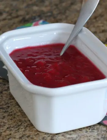 A serving container with rhubarb compote