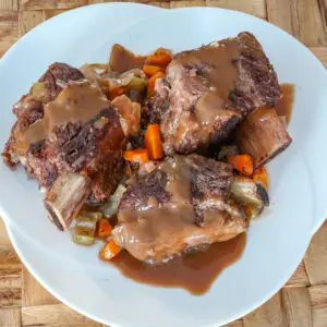 slow cooker short ribs on a serving platter