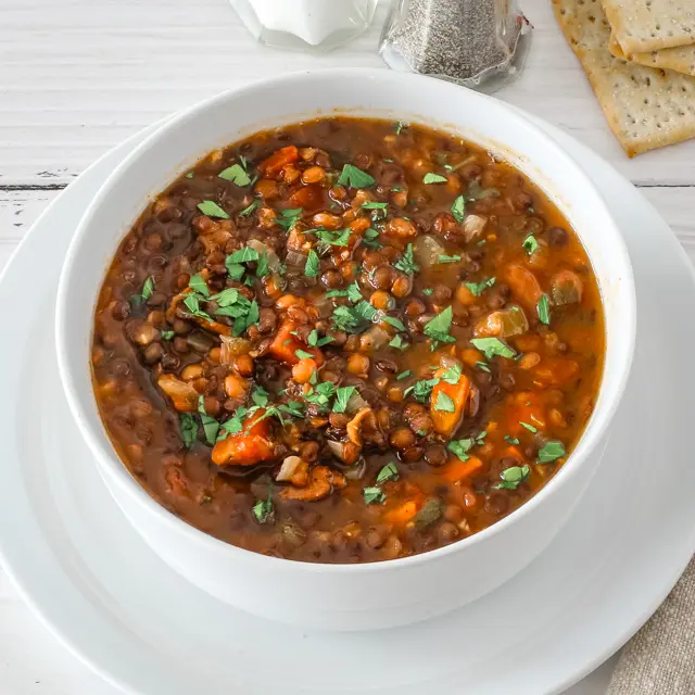 A bowl of slow cooker lentil soup.