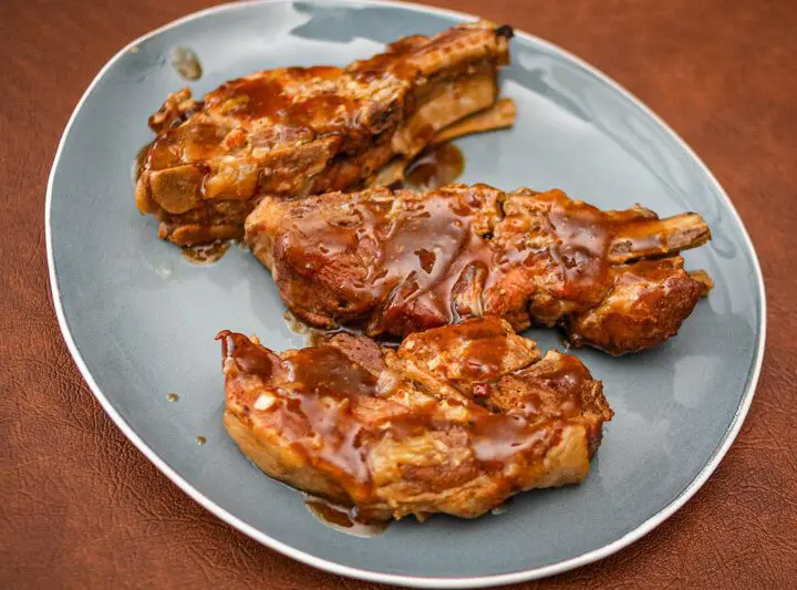 slow cooker marmalade spareribs on a serving plate