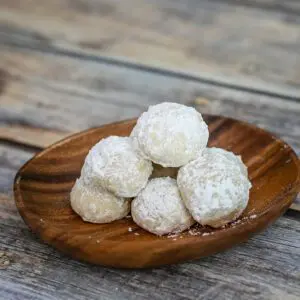 butter pecan snowball cookies on a serving plate