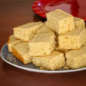 buttermilk cornbread stacked on a plate