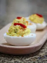 deviled eggs on a serving dish