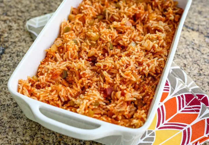 A serving dish with Spanish rice.