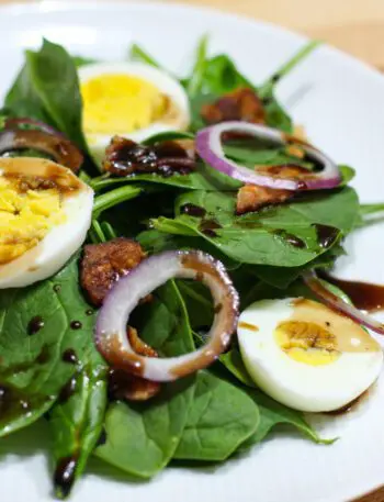 spinach salad on a plate