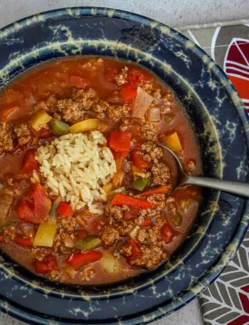 Stuffed pepper soup with ground beef, rice, and tomatoes.