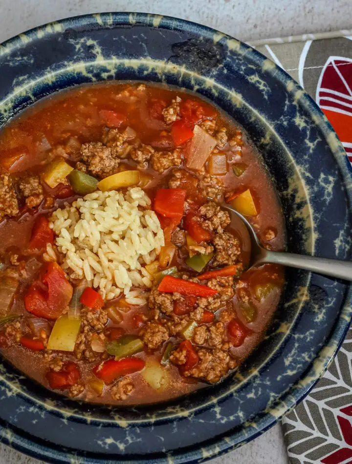 Stuffed pepper soup with ground beef, rice, and tomatoes.