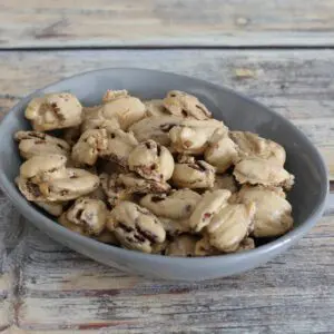 sugared pecans in a small snack dish