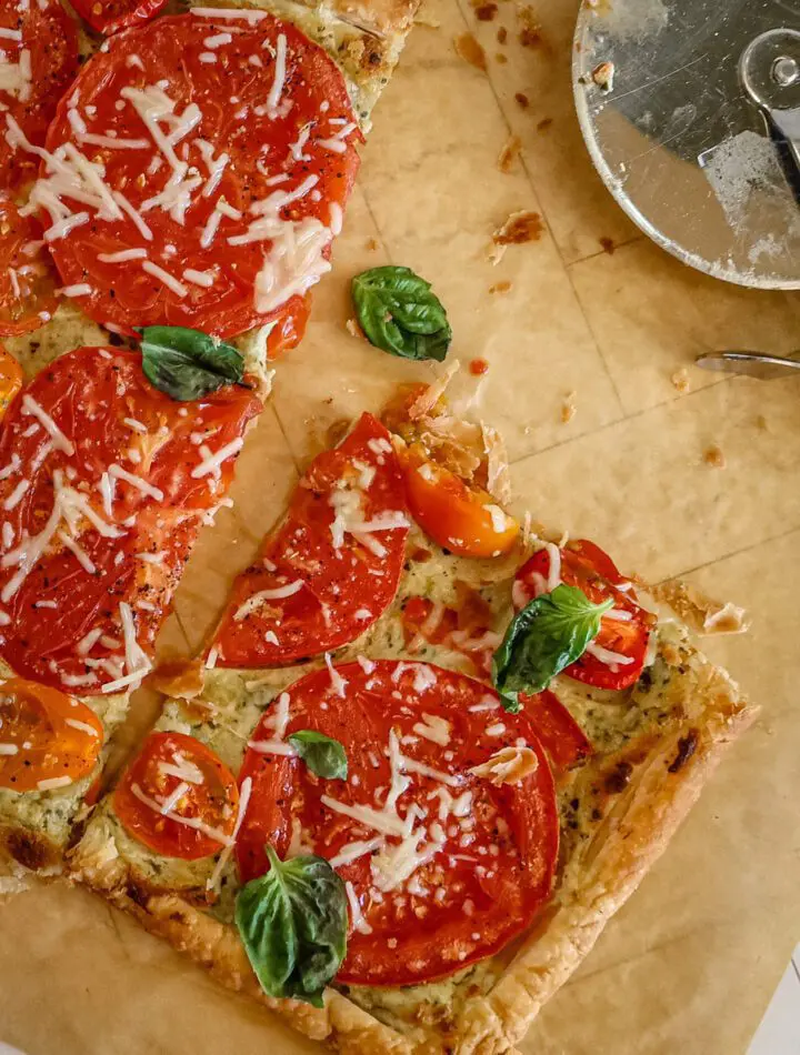 A sliced summer tomato tart.