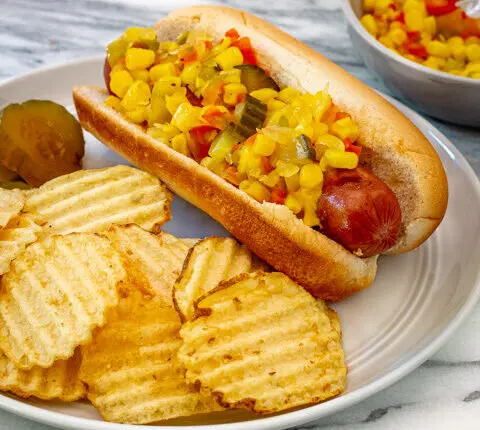 Home canned corn relish on a hot dog.