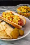 spicy corn relish on a hot dog