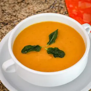 a bowl of roasted sweet potato soup