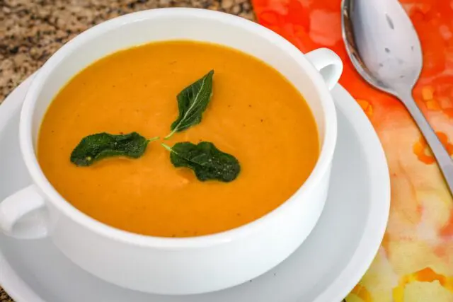 A bowl of roasted sweet potato soup