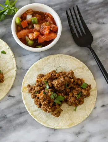 taco meat on a tortilla