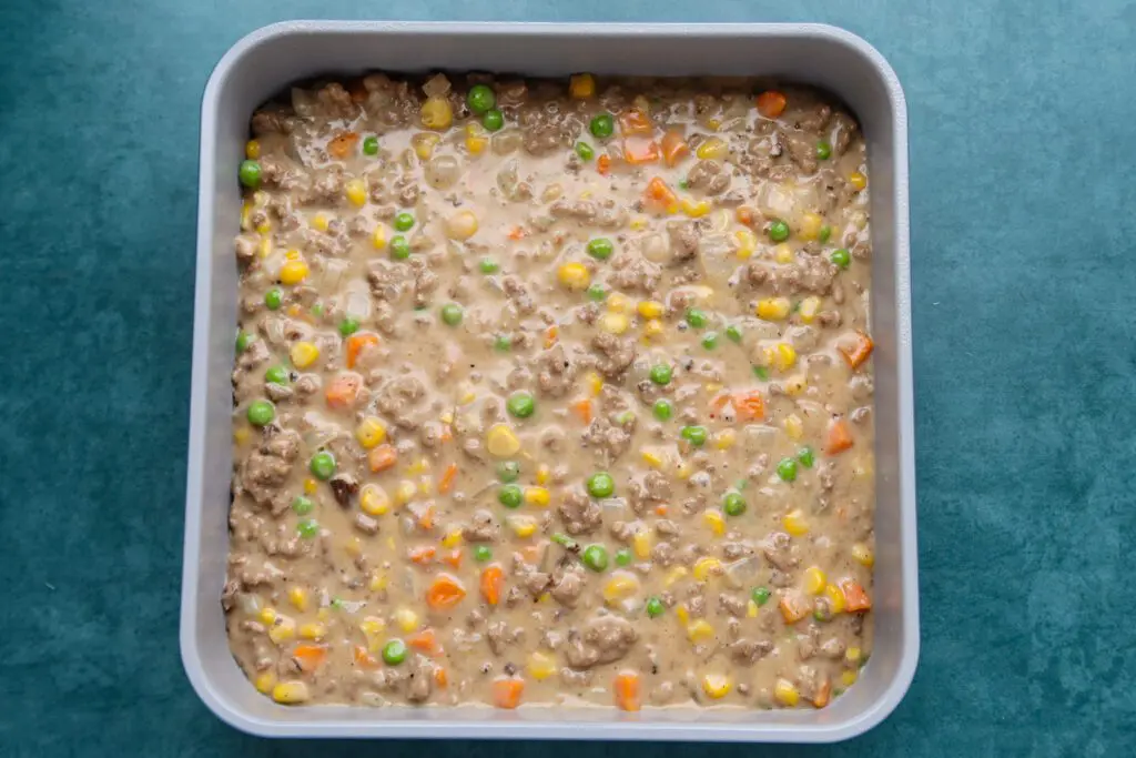 tater tot casserole filling in the baking dish