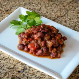 black beans with tex-mex flavors on a small plate