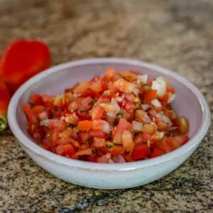 a bowl of fresh tomato salsa