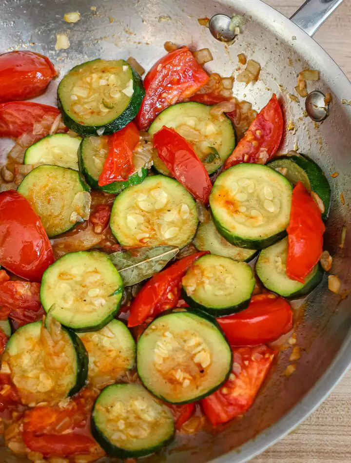 zucchini and tomatoes in a skillet