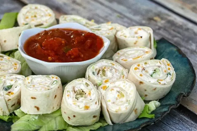 tortilla roll-ups with salsa for serving